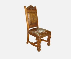 Silla tallada tapizada en piel cincelada
