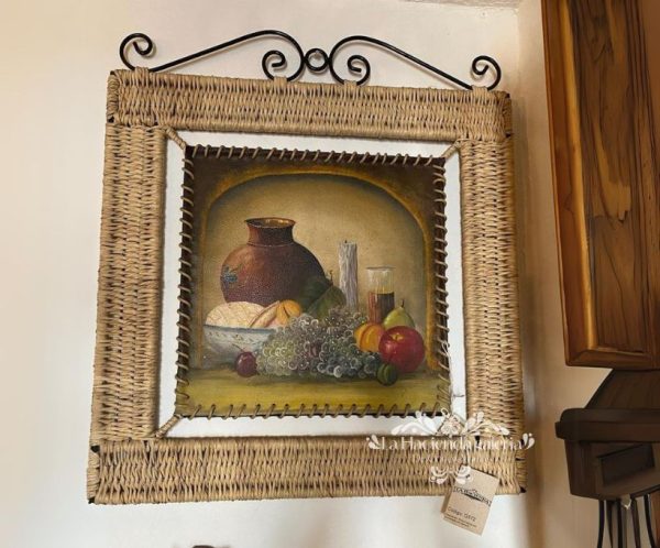 Pintura al óleo sobre piel enmarcada en herrería y palma tejida